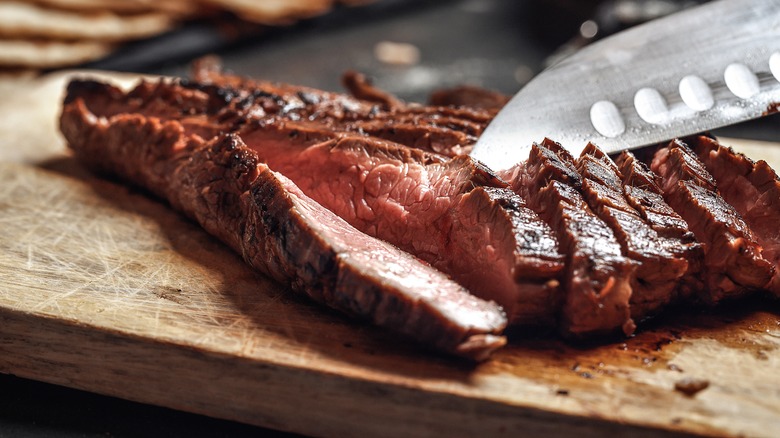 letting meat rest on cutting board