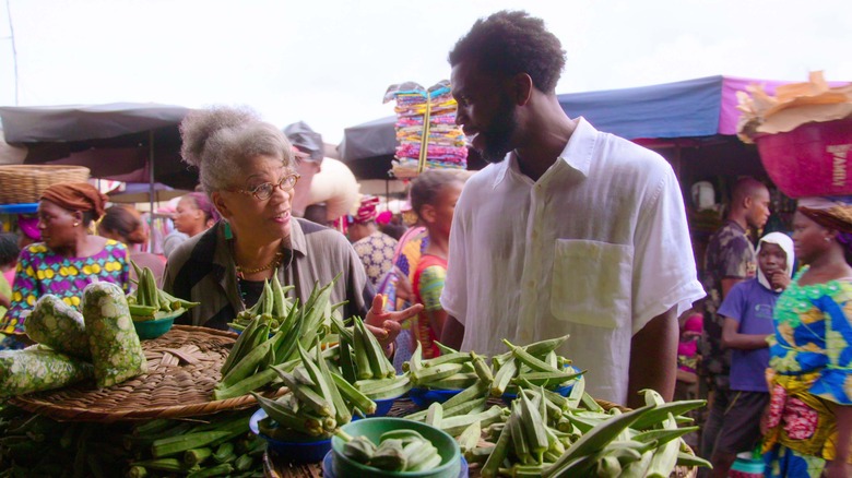 Stephen Satterfield at farmers market with okra