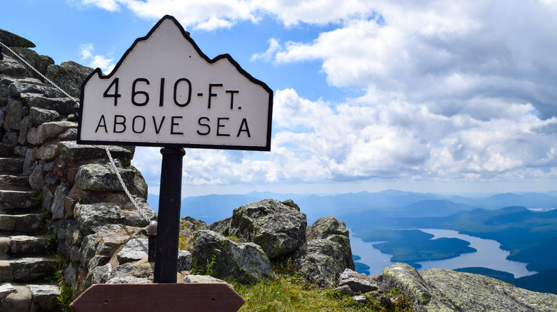 Altitude sign on mountain stairs