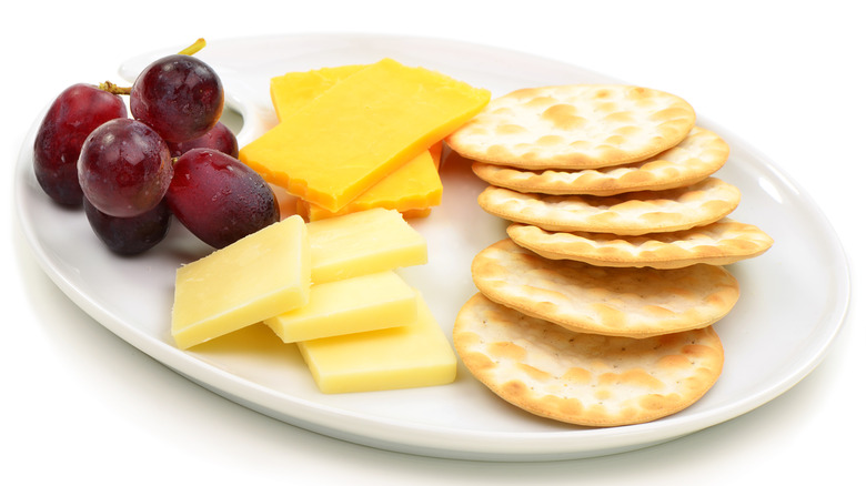 cheese and crackers on plate