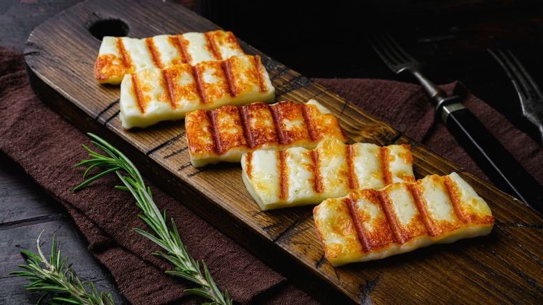 grilled halloumi on a wooden board