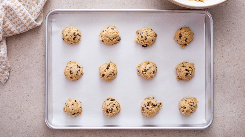 cookie dough balls on sheet tray