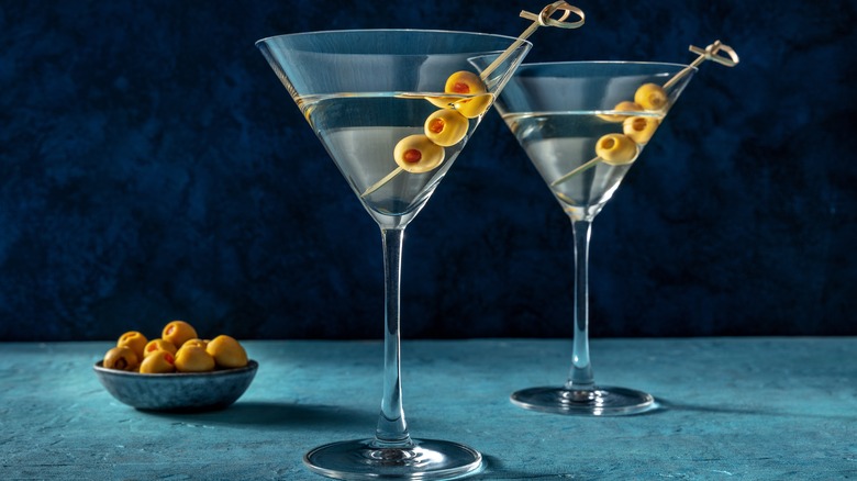 two martinis with olives