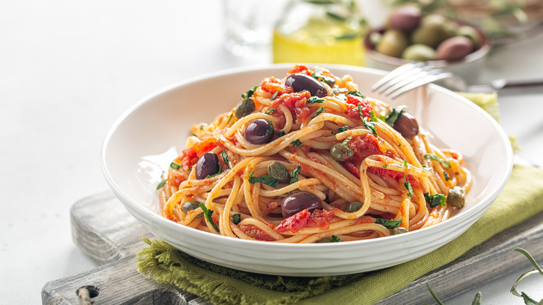 bowl of spaghetti with olives