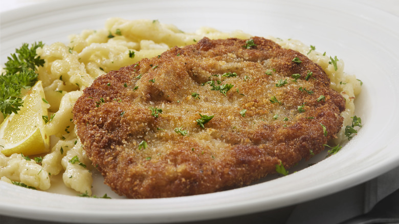 breaded schnitzel cutlet on plate