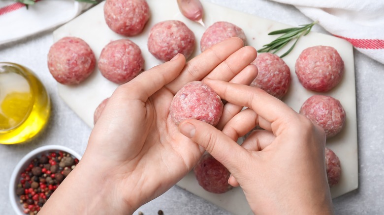 rolling meatballs in hand