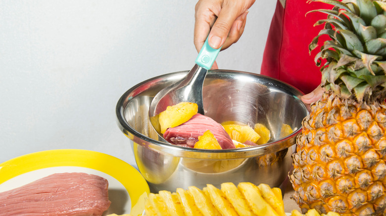 Meat marinating with pineapple