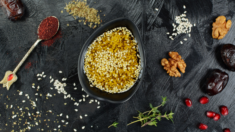 za'atar salad dressing black background 