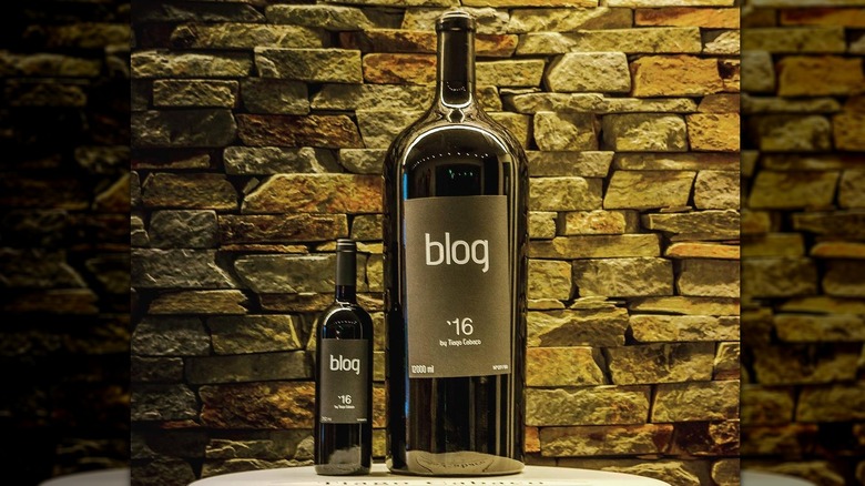 A standard bottle and Balthazar bottle of Blog wine