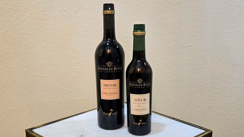 Demi and standard bottles of Gonzalez Byass sherry wine