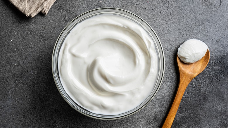 Bowl of yogurt with a spoon
