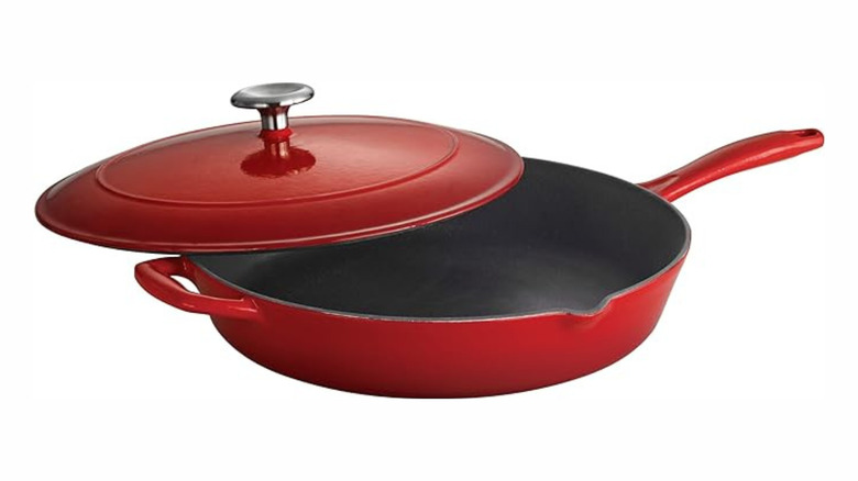 Red cast iron skillet with lid