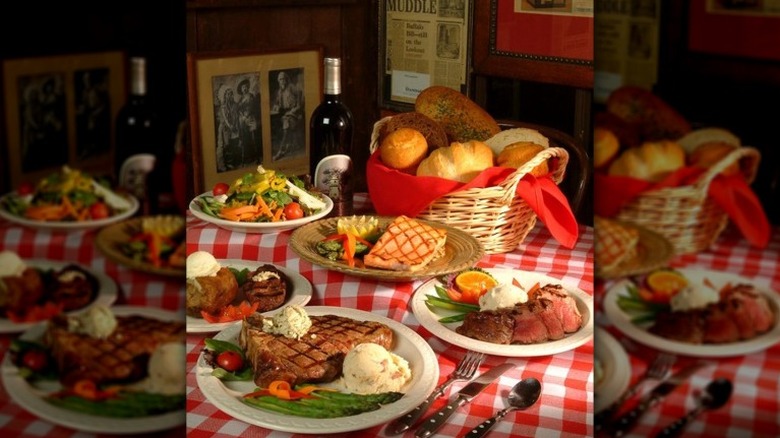 Plates of fish, steak