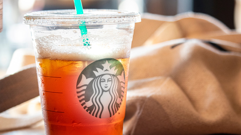 Starbucks cup with iced tea in it