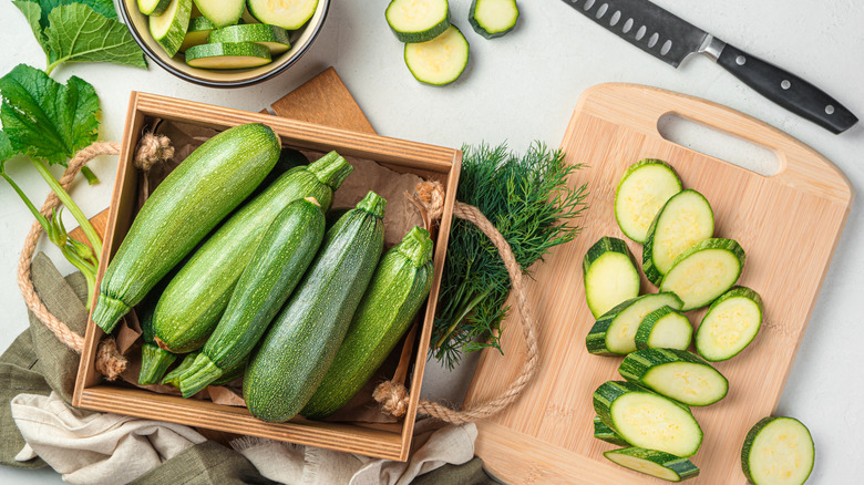 Whole and sliced zucchini