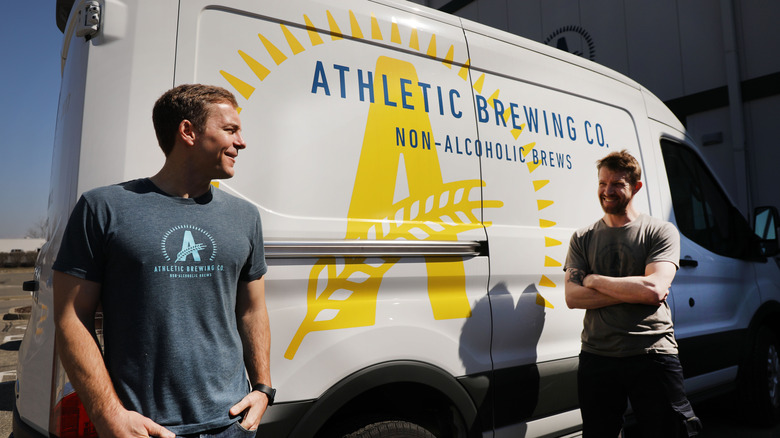 Athletic Brewing Company van with men