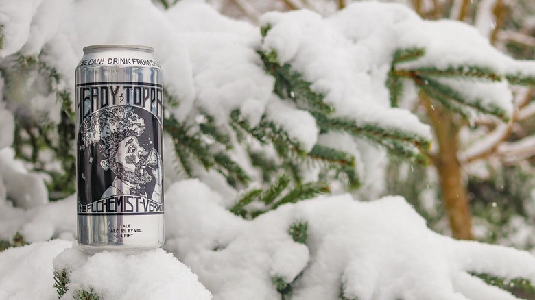 Can of Heady Topper on tree branch