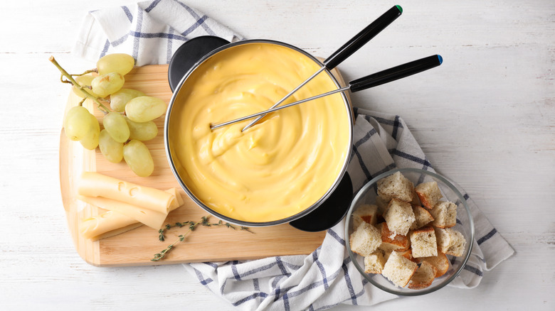 pot of melted cheddar fondue