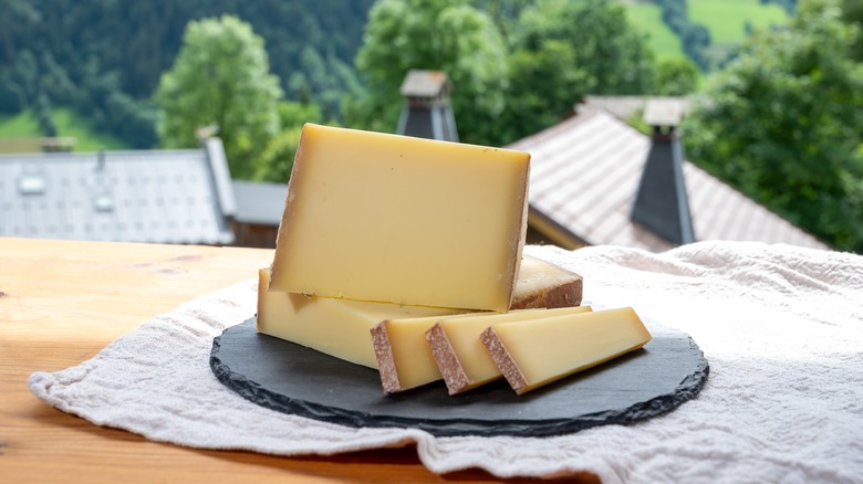 comte cheese slices on tray