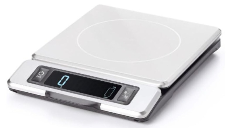 A white Oxo Good Grips kitchens scale