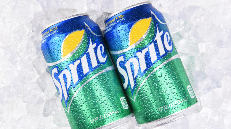 two cans of Sprite 