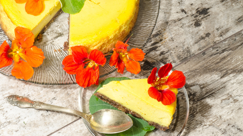 orange cheese cake with nasturtium garnishes