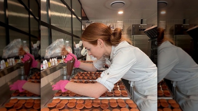 Brooke Saward filling macarons