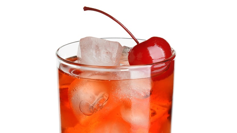 whiskey cocktail with cherry