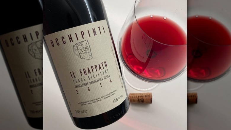 bottle and glass Occhipinti frappato