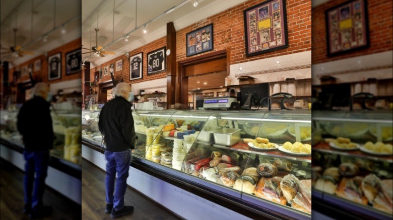 Customer at Factor's Famous deli counter