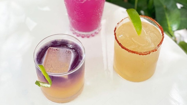 three colorful cocktails