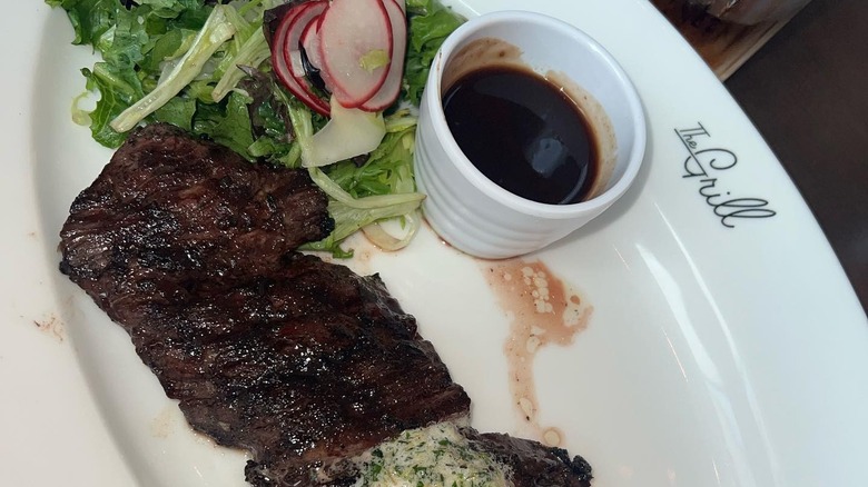 sliced steak on plate