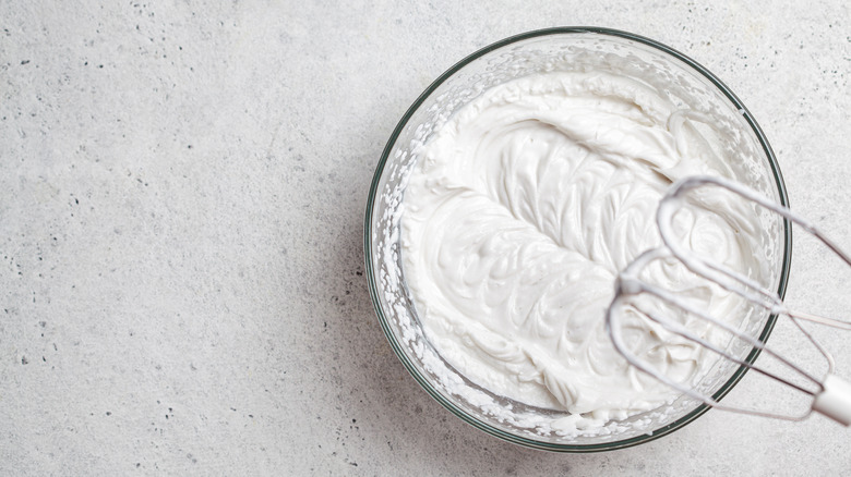 Whipped coconut cream in bowl