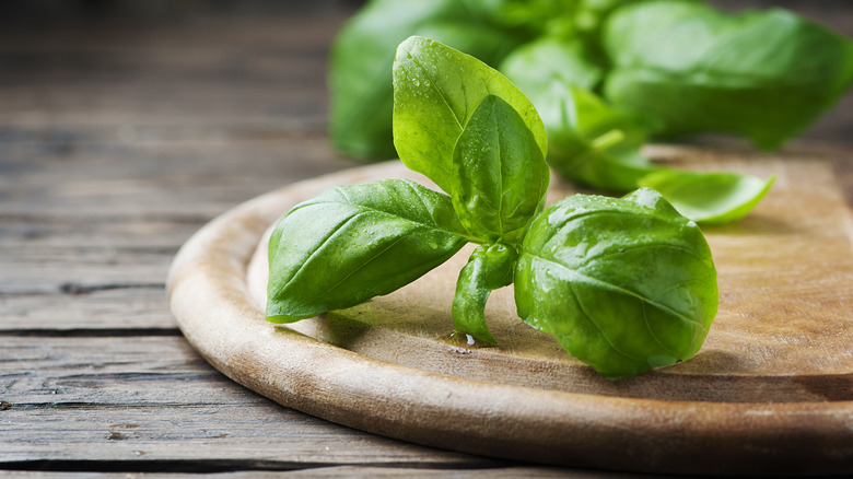 fresh basil on cutting board