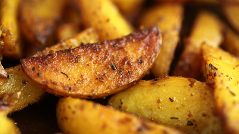 Closeup of roasted potato wedges