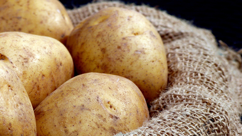 Basket of russet potatoes