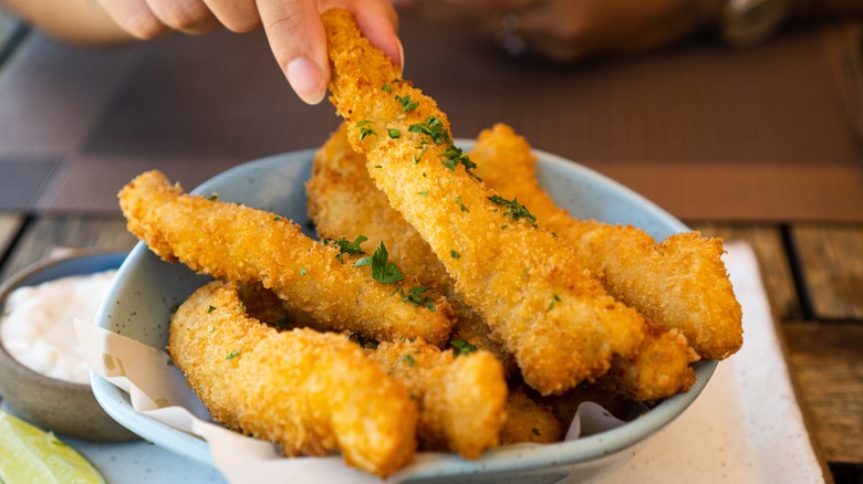 fried fish sticks in bowl