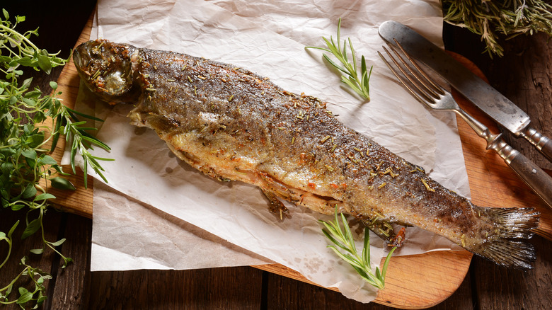 Whole fried trout with herbs