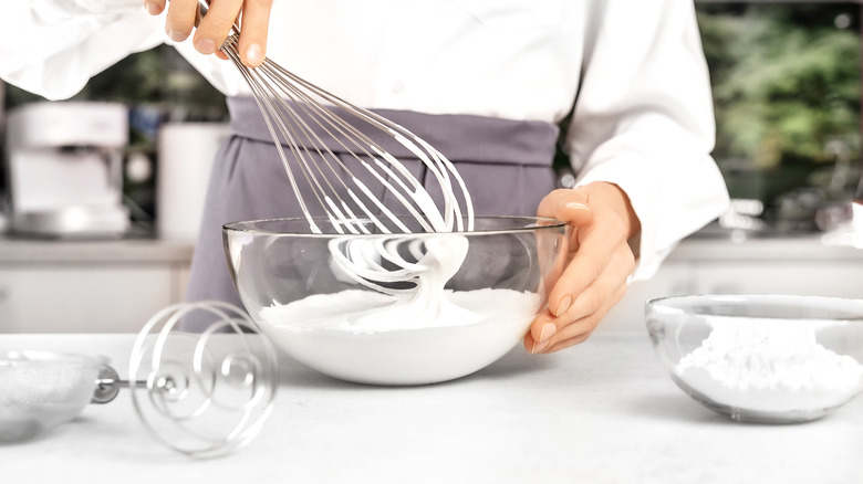 Homemade whipped cream in bowl