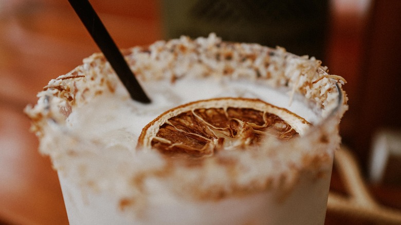 Tropical drink with toasted coconut