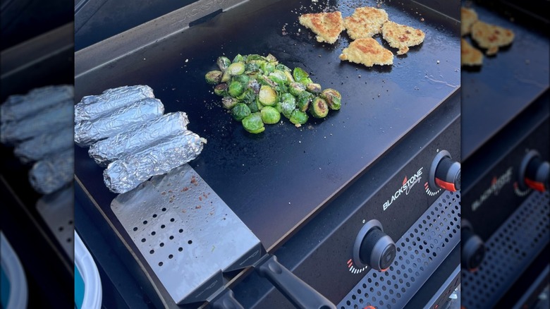 Food cooking on griddle