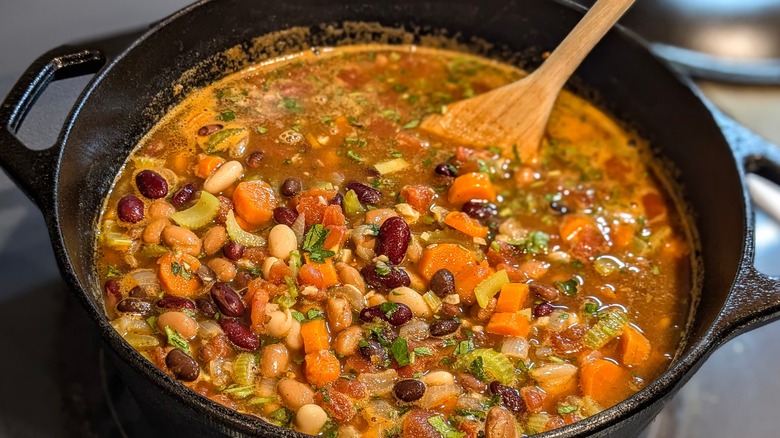 Close-up of pot of multi-bean stew in cast iron Dutch oven