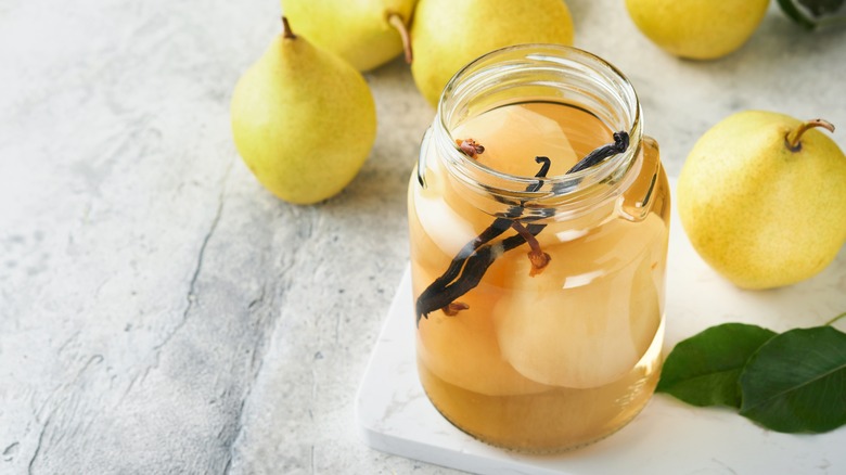 Pears on counter in jar