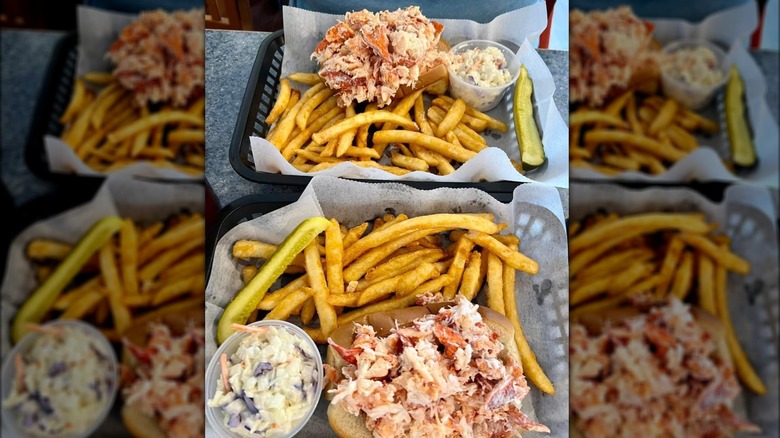 two lobster rolls with fries