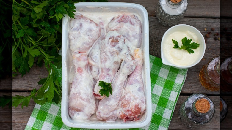 Chicken marinating in a yogurt sauce