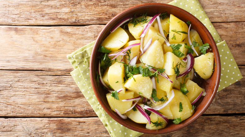 Greek potato salad in bowl