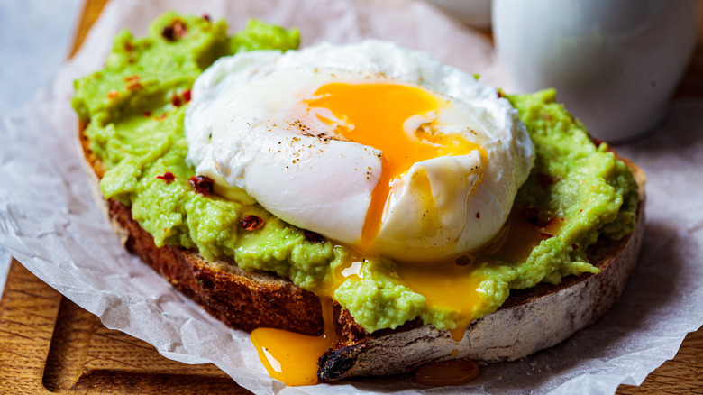 Avocado toast on white paper