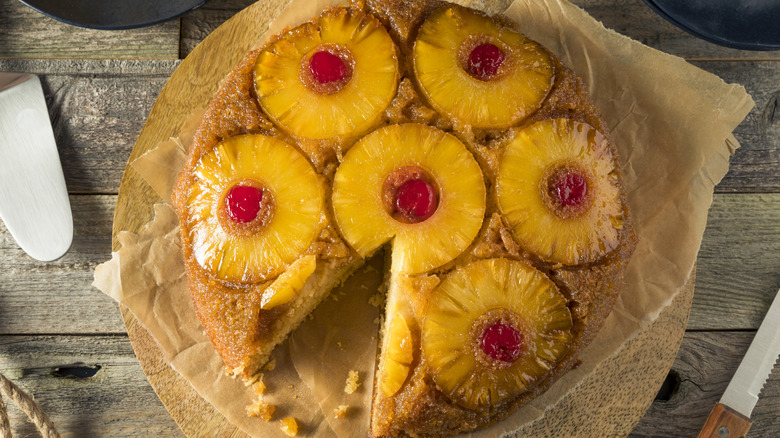 Pineapple upside-down cake with a slice cut out