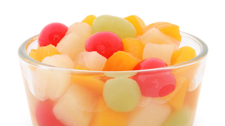 Canned fruit cocktail in a glass bowl