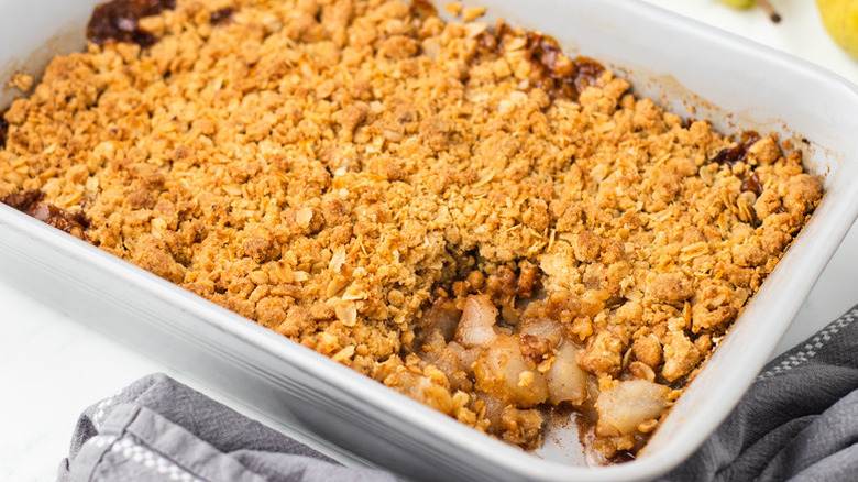 Pear crumble in a white oven dish
